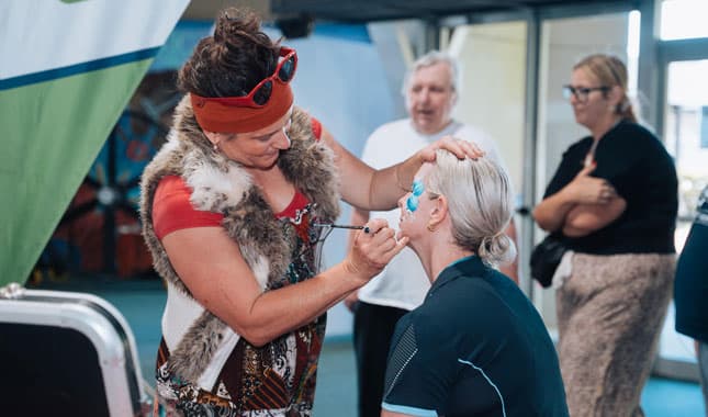 Exhibitor booth displaying mobility solutions